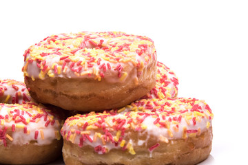 Stack of iced ring donuts