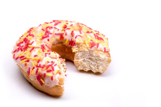 Partially eaten iced ring donu