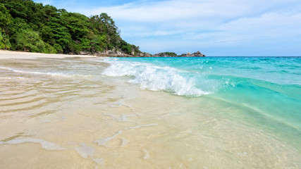 Beautiful landscape blue sea white sand and waves on the beach during summer at Koh Miang island in Mu Ko Similan National Park, Phang Nga province, Thailand, 16:9 widescreen
