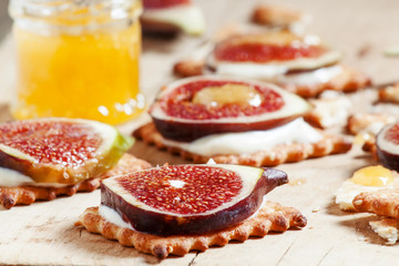 Breakfast with biscuits, homemade yogurt, ripe sweet figs and ho