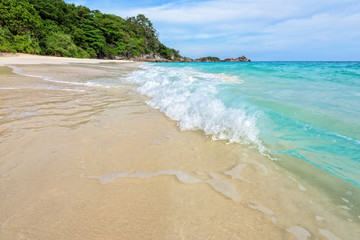 Beautiful landscape blue sea white sand and waves on the beach during summer at Koh Miang island in Mu Ko Similan National Park, Phang Nga province, Thailand
