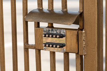 combination lock on the iron bars