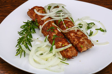 Kebab with onion rings