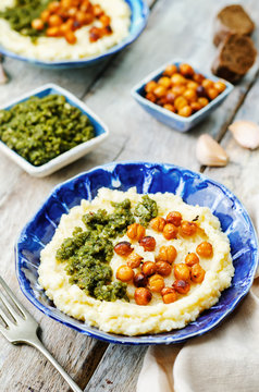 cheese polenta with Basil nuts pesto and roasted spicy chickpeas