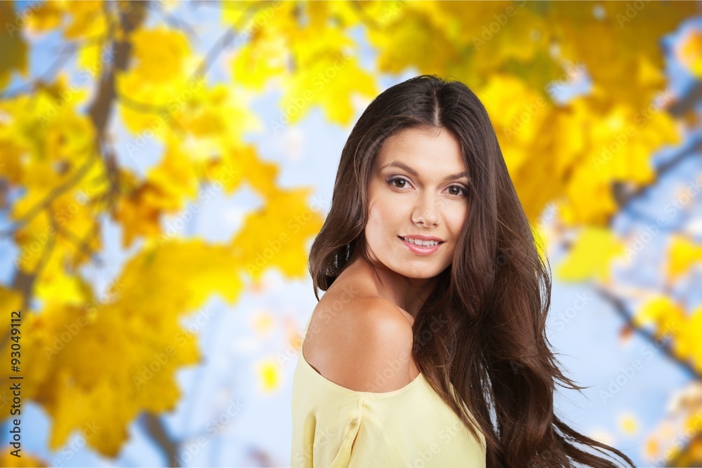 Wall mural autumn woman.