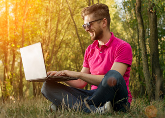 Obraz premium Man Sitting In Park