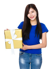Asian woman holding a big present box