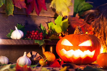 Halloween pumpkin head on wooden background