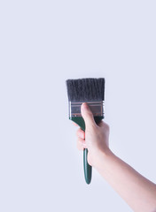 paint brush with hand. paint brush with hand on a background.