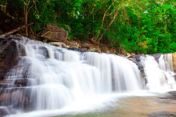 Fototapeta na wymiar paradise Waterfall located deep forest