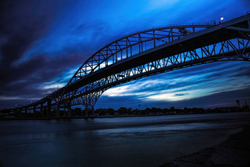 Blue Water Bridge at dusk in silhouette.