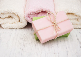 Obraz na płótnie Canvas Bath towels and handmade soap