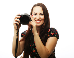 Cheerful young woman making photo 