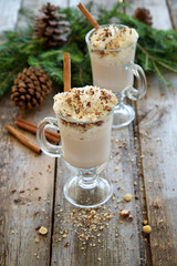 Cocoa with whipped cream, nuts and chocolate 