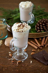 Cocoa with whipped cream, nuts and chocolate 