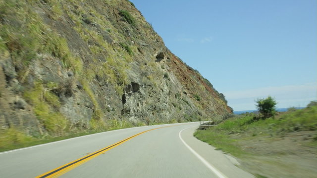Vehicle point-of-view driving south on California Highway 1 (aka Cabrillo Highway) in the Big Sur area of Central California.