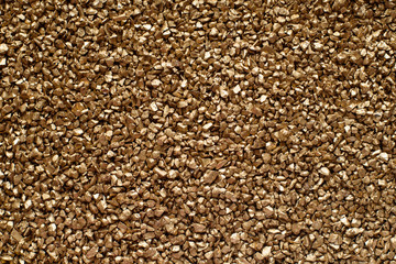Small Gold Particles of Decoration Stones Background