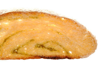 Slice of wheat bread with pesto isolated over white.