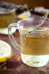 ginger tea with lemon and dry thyme