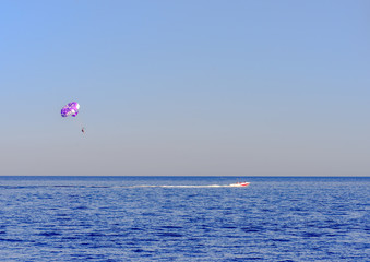 Motorboat towing a parasail