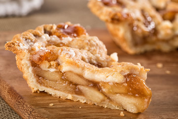 Slice of mouth watering rustic apple pie - obrazy, fototapety, plakaty