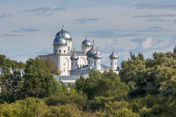 Fototapeta na wymiar Dome of the temple the old Orthodox monastery in the summer landscape. Yuriev Monastery in the neighborhood Veliky Novgorod