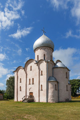 Fototapeta na wymiar Old Orthodox Nereditsa Church in the vicinity Veliky Novgorod on a sunny summer day 
