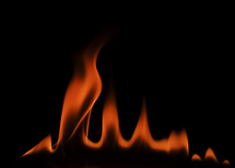 Fire concept Isolated on black backgrounds and texture