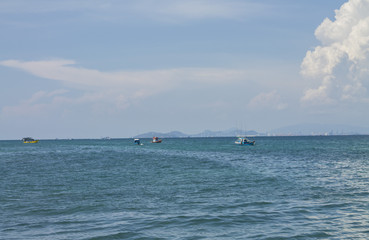 Naklejka premium seascape with fishing boats