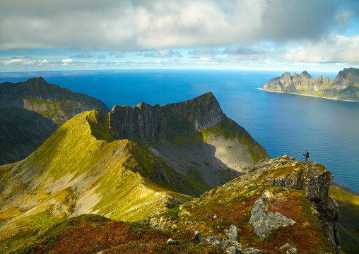 Photographer shooting northern Norway mountains