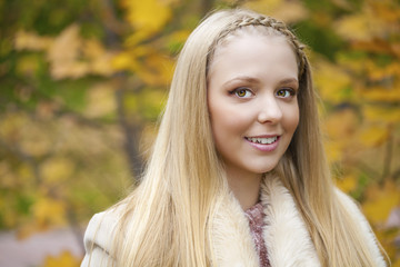 Naklejka premium Portrait close up of young beautiful blonde girl