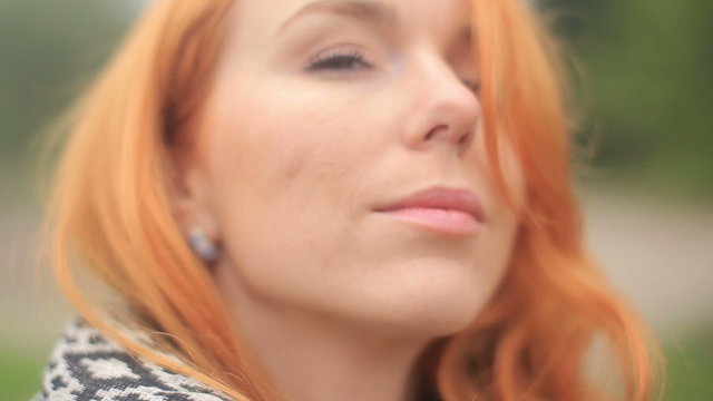 Young woman with red hair 