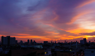 view of Bangkok downtown city night lights with sunset