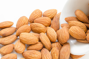 Almond in white bowl.