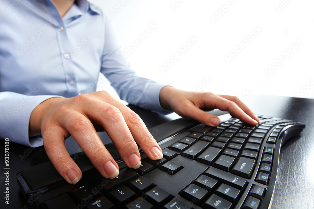 Leinwandbilder hands typing on computer keyboard.