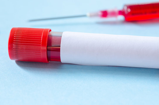 Syringe And Plastic Test Tube.