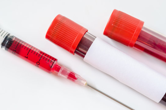 Syringe And Plastic Test Tube.