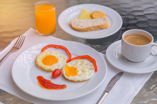 Happy Face Frying Eggs for breakfast