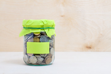 coins in a glass jar