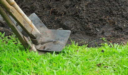 spade tools in the garden on nature background