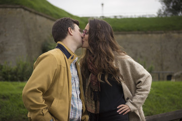 Fototapeta premium Young couple, boyfriend and girlfriend kissing