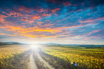 sunet over dirt road