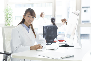 Fototapeta premium Young woman doctor