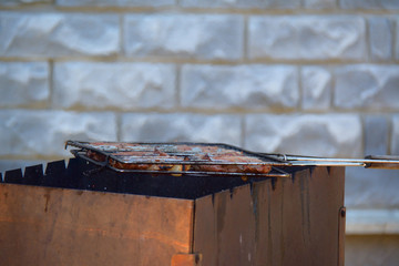 grill with steaks for the barbecue, side  view