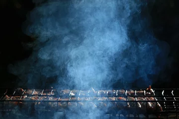 Fotobehang gegrild vlees rook gerookt barbecue © kichigin19