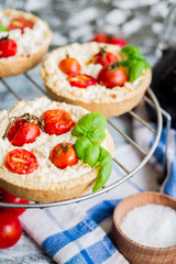 sand tarts with goat cheese and cherry tomatoes, vegetarian food
