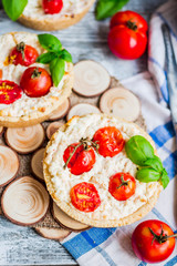 sand tarts with goat cheese and cherry tomatoes, vegetarian food