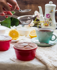 sprinkle with powdered sugar lemon pudding red saucers, tea