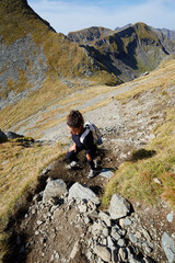 Fototapeta na wymiar Woman hiker on a trail