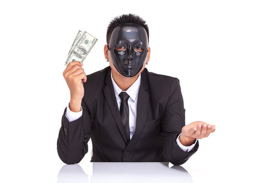insincere espionage businessman with black mask holding bank not